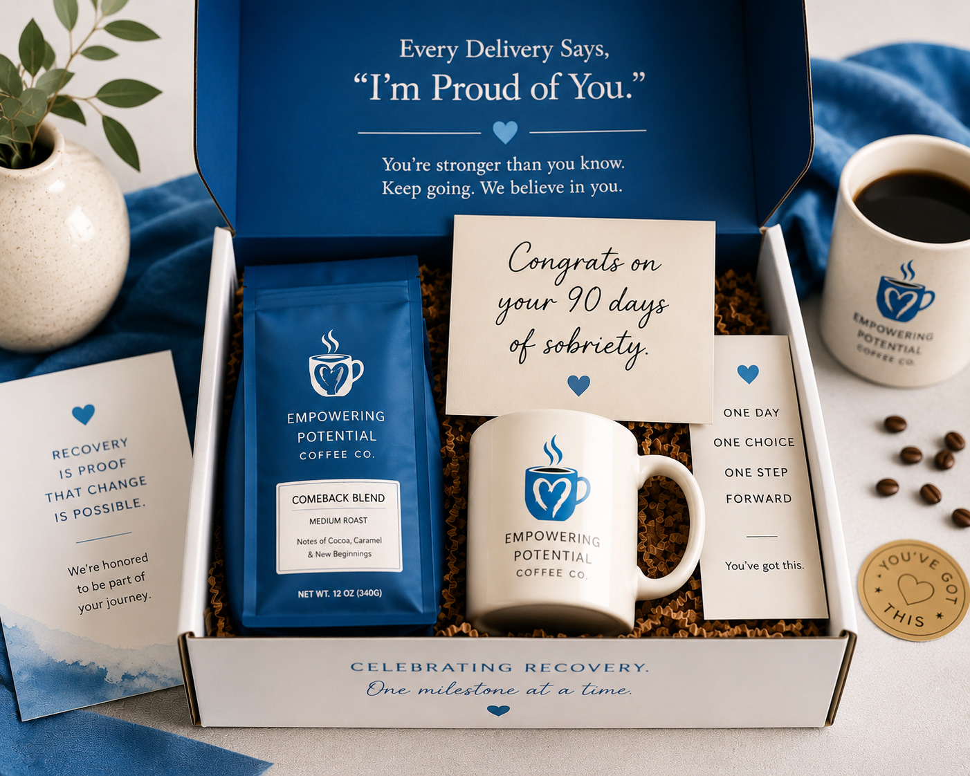 The Proud of You Coffee Box with coffee, mug, and recovery milestone card